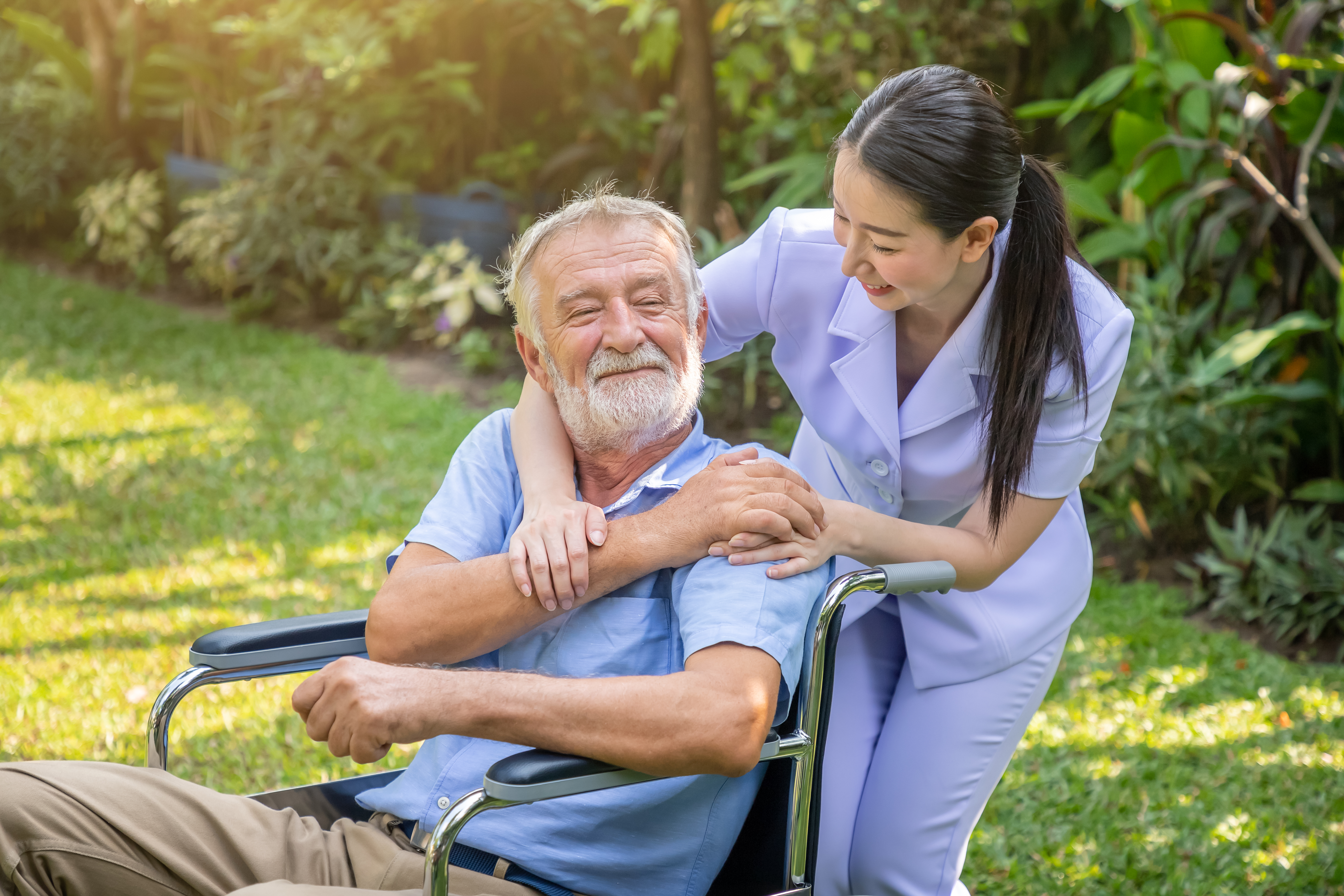 Esha Home Care caregiver with patient at home